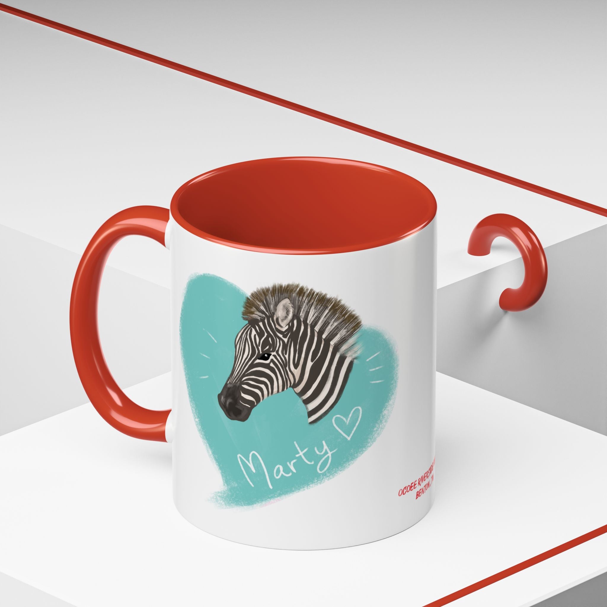 A zebra adorned with the word "Marty" creatively integrated into its stripes at Ocoee Riverside Farm Coffee Mug