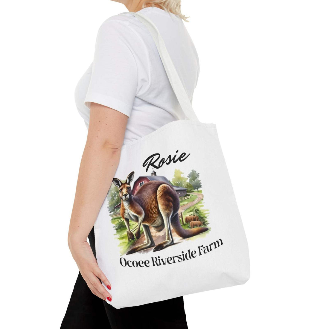 Woman carrying a white Rosie Kangaroo Tote Bag with Ocoee Riverside Farm design, eco-friendly shopping bag with kangaroo illustration.