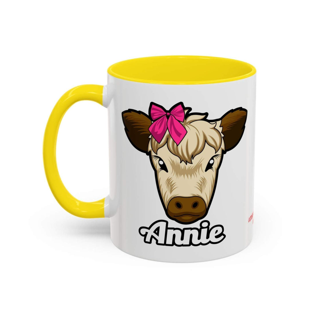 Farmhouse cow coffee mug with Annie and red bow design, yellow handle and rim.