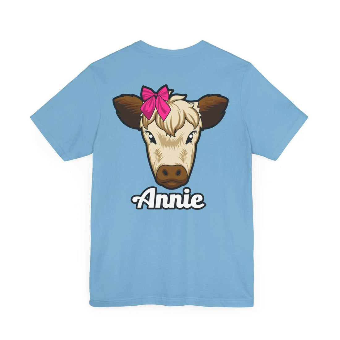 Blue Farm Life T-Shirt featuring Annie the Cow with a red bow, perfect for rural lifestyle lovers.
