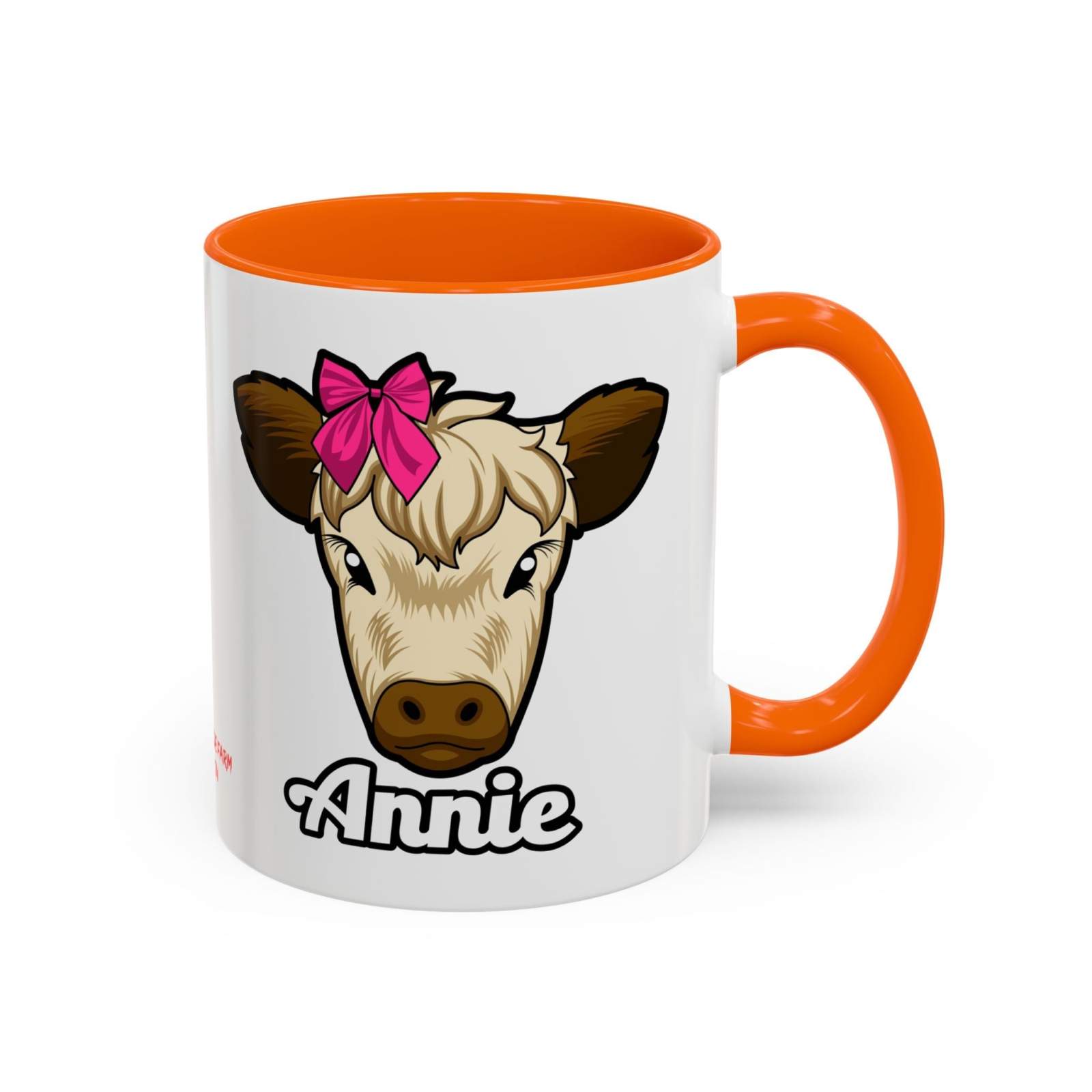 Farmhouse cow coffee mug with Annie design and red bow on white ceramic.