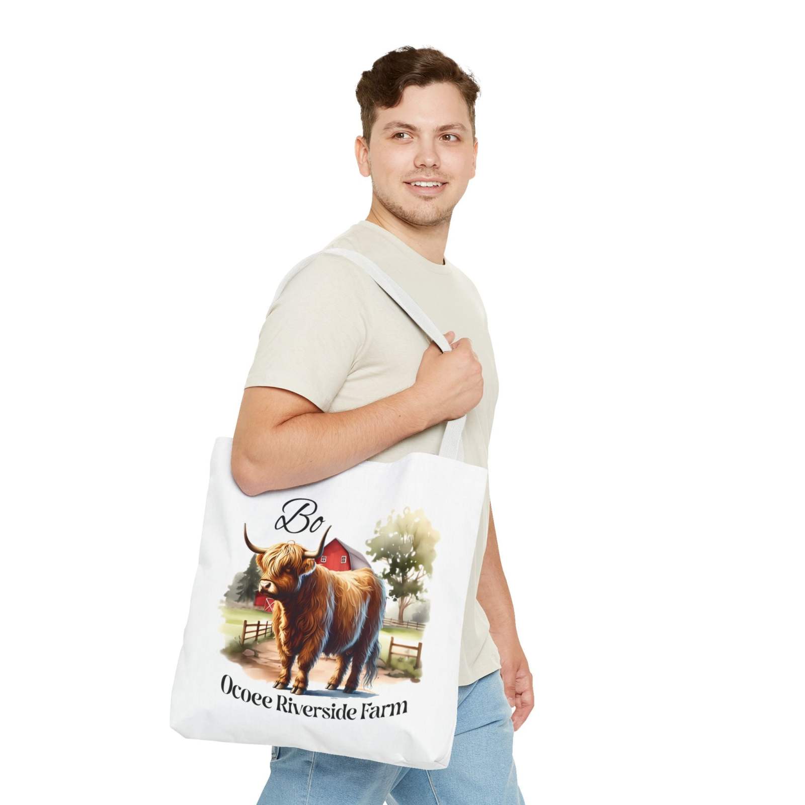 Man carrying Bo Scottish Highland Tote Bag with Highland cow design from Ocoee Riverside Farm eco-friendly shopping bag